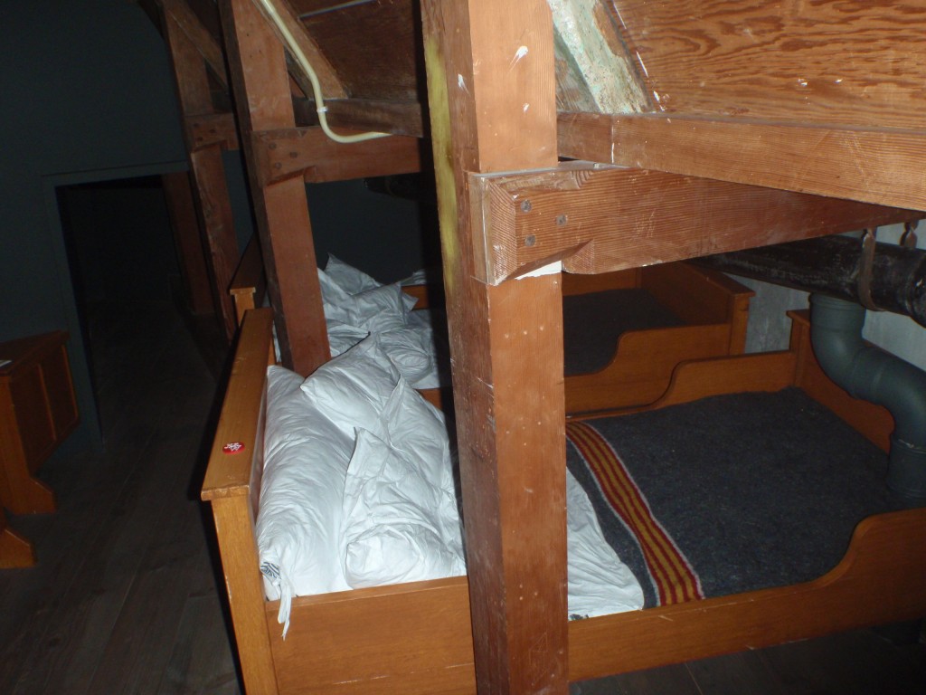 Small, cramped beds in the attic.